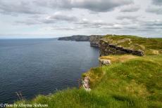 Ireland 2017 - Classic Car Road Trip: The Cliffs of Moher seen from Hag's Head. The Cliffs of Moher are situated at the southwestern edge of the Burren,...