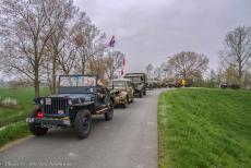 Commemoration Operation Quick Anger 2018 - Commemoration Operation Quick Anger 2018: A convoy of historic WWII military vehicles on a small dyke road near Westervoort. Towards the end of...