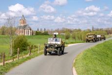 Commemoration Operation Quick Anger 2019 - Operation Quick Anger Commemoration 2019: WWII military vehicles on the dyke road near Oud-Zevenaar, with St Martin's Church in the... Commemoration Operation Quick Anger 2019 - Operation Quick Anger Commemoration 2019: WWII military vehicles on the dyke road near Oud-Zevenaar, with St Martin's Church in the...