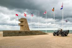 75th anniversary of D-Day - Classic Car Road Trip Normandy, 75 years after D-Day: Our own Ford GPW Jeep in front of the Monument 6 June 1944 in Bernières-sur-Mer,...