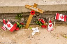 75th anniversary of D-Day - Classic Car Road Trip Normandy, the 75th anniversary of D-Day: A small Remembrance Poppy Cross placed in front of the Canada...