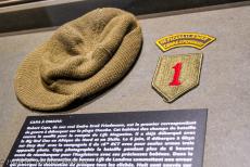 Normandy, 75 years after D-Day - Memorial tour in a Ford GPW Jeep through Normandy: The M&eacute;morial de Caen Museum exhibits the woolen commando jeep cap of the war...