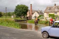 IMM 2019 Bristol - Classic Car Road Trip: Horses in the River Eye at the Old Mill of Lower Slaughter, our classic Mini in the foreground. Slaughter is...