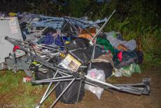 IMM 2019 Bristol - Classic Car Road Trip, IMM 2019 Bristol: One of the many piles of destroyed tents, badly torn canvas or other tent material and a tangle of...