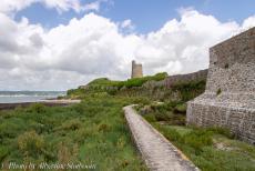 80th anniversary of D-Day - Normandy 2024: Fort de la Hougue and the Vauban Tower. The tower is linked to the Port of Saint-Vaast-la-Hougue by a massieve dam....