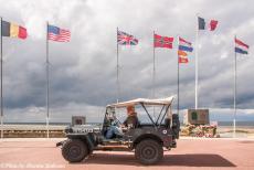 Normandy 2009 - Normandy 2009: The Jeep in front of a WWII memorial in Bernières-sur-Mer. The memorial was erected in memory of the Regiment...