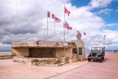 Normandy, 65 years after D-Day - Commemorating D-Day, the 65th anniversary: Our own RAF-blue Jeep next to a WWII German bunker on Juno Beach in Berni&egrave;res-sur-Mer. It was...